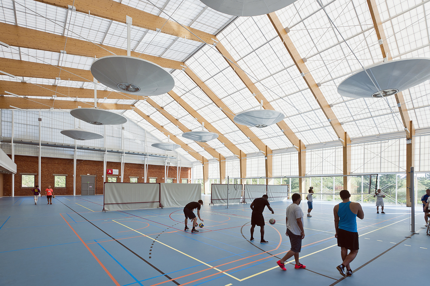 Athletes enjoy glare-free light at a Belgium recreation center.