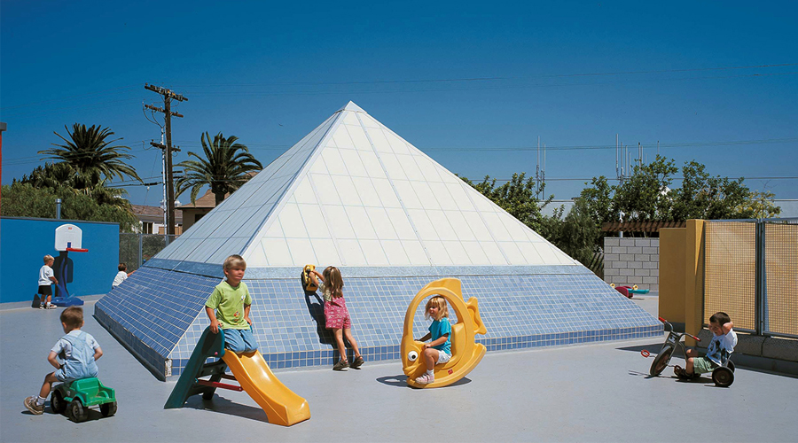 Children enjoy a Kalwall pyramid design in Manhattan Beach, Calif.
