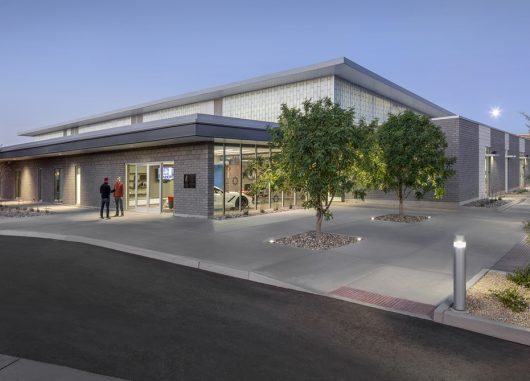 Exterior of Glendale Community College Automotive Technology building featuring Kalwall wall panel facades with FRP panels