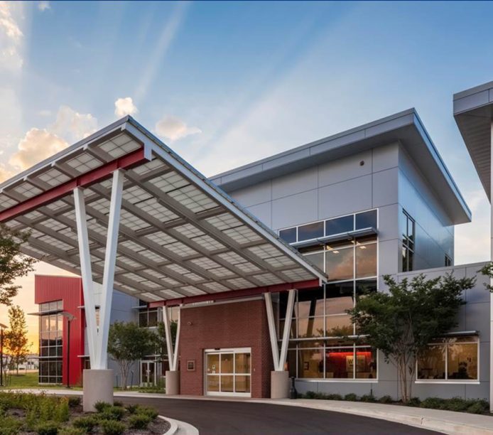 West Tennessee Transitional Care Facility exterior featuring a Kalwall canopy at sunset