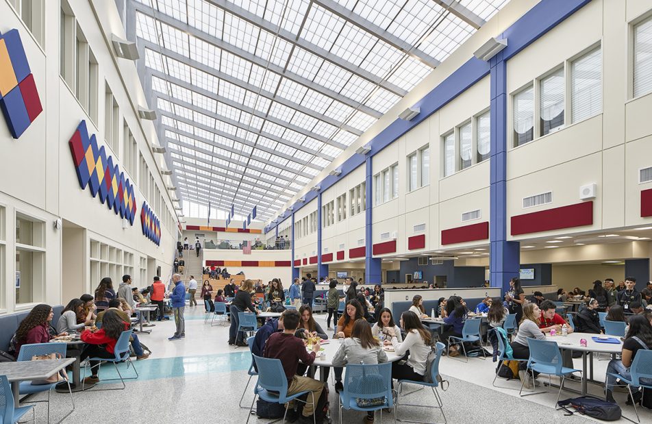 Hudson County Tech High School in Secaucus, New Jersey, featuring students sitting in atrium under Kalwall skyroof®