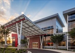 West Tennessee Transitional Care Facility exterior featuring a Kalwall canopy at sunset