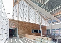 CANMET Laboratory interior featuring sloped aluminum ceiling with Kalwall translucent wall system and wooden wall panels