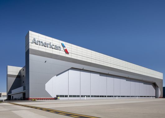 Exterior of American Airlines Hangar 2 at Chicago O'Hare Airport featuring Kalwall wall panel system on upper third