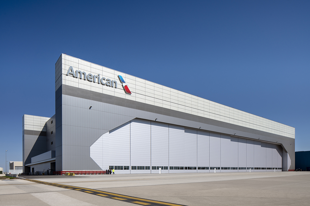 Exterior of American Airlines Hangar 2 at Chicago O'Hare Airport featuring Kalwall wall panel system on upper third