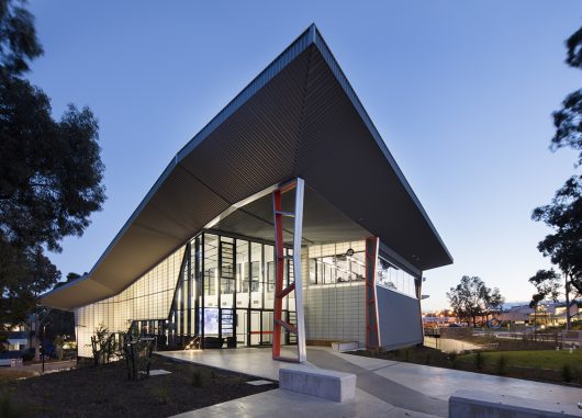 Centre for Advanced Design + Training exterior featuring a geometric roof and curtain wall system of FRP panels from Kalwall