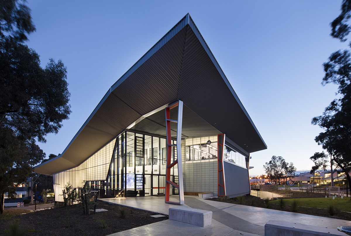 Centre for Advanced Design + Training exterior featuring a geometric roof and curtain wall system of FRP panels from Kalwall