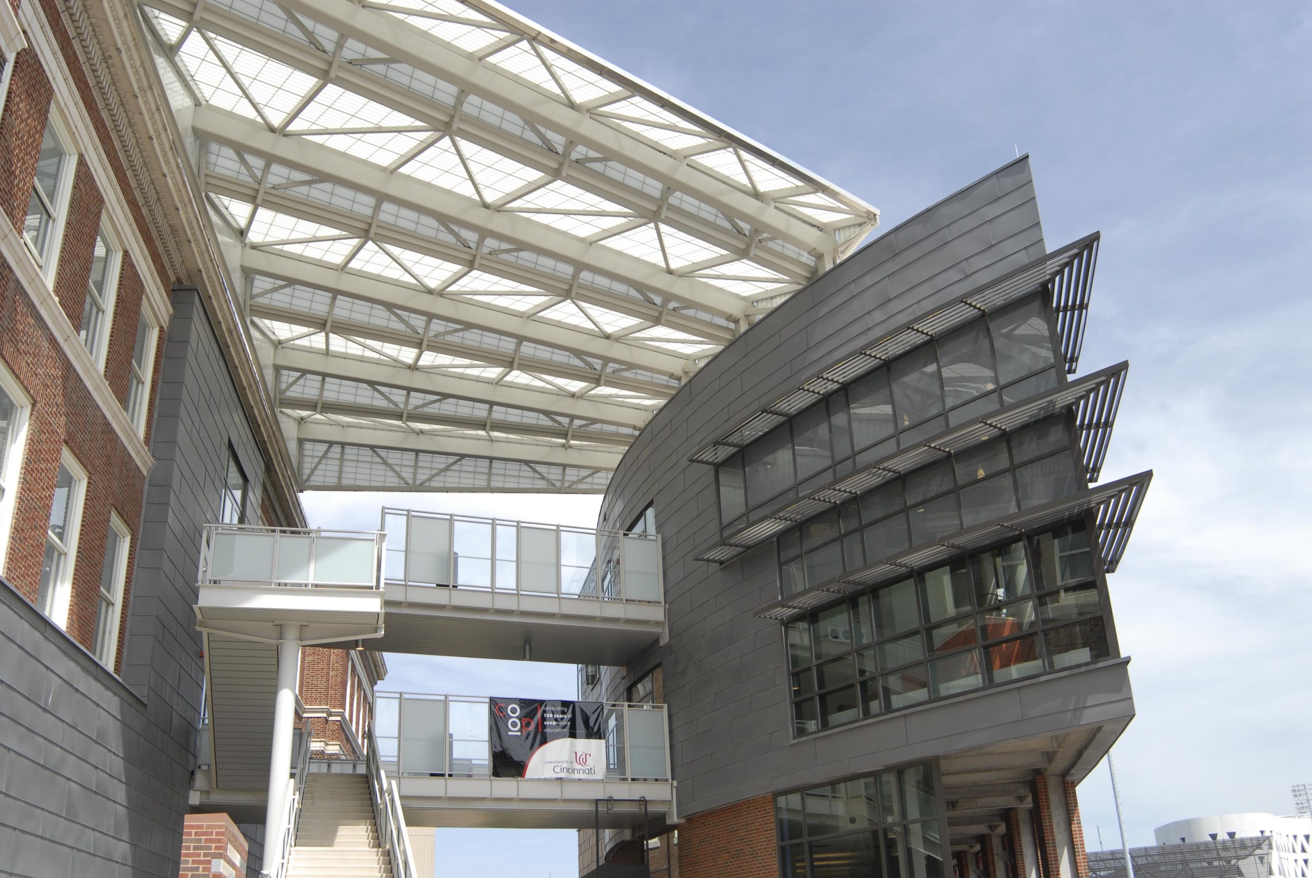 University of Cincinnati Student Life Center featuring two buildings attached by walkway with Kalwall canopy above