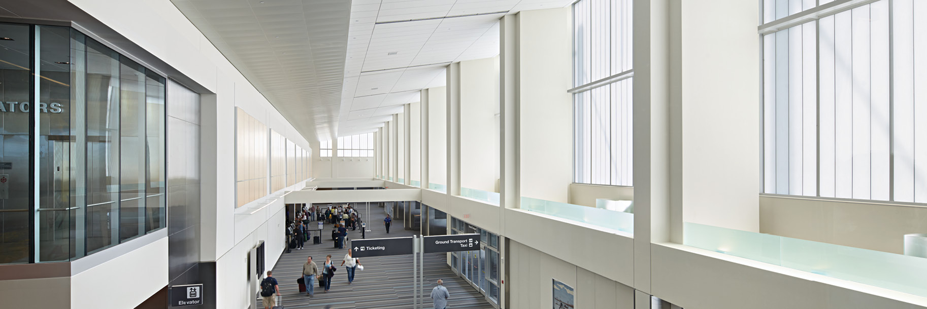 Interior of Raleigh-Durham International Airport featuring Kalwall facades on exterior-facing wall