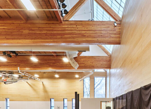 Interior featuring Kalwall skylight set amongst wooden paneling at the James North Baptist Church.