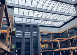 Butler interior featuring Kalwall skyroof® amongst metal and wooden detailing.