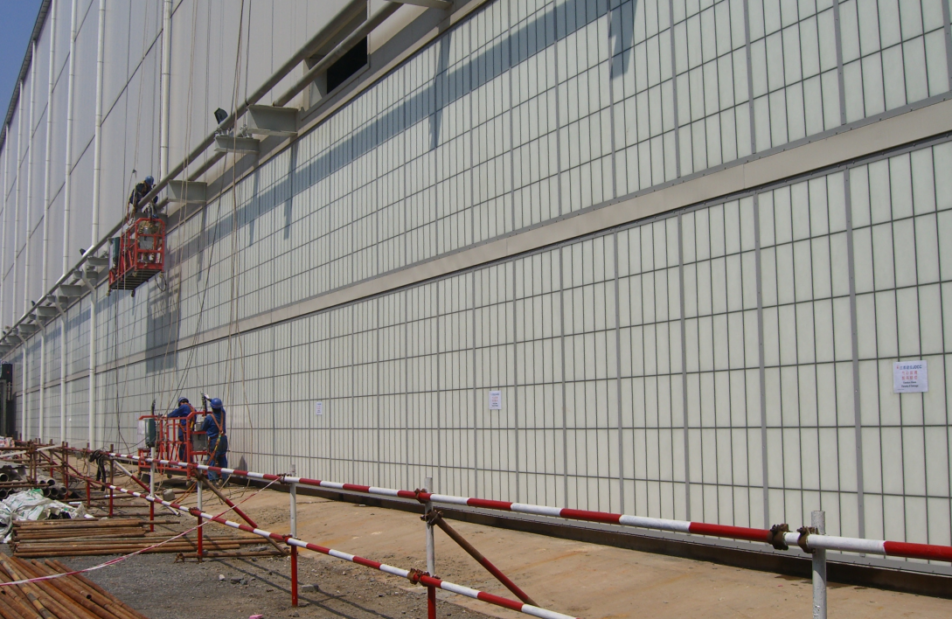 Image of an industrial facility that was damaged by an explosion where damage was mitigated by Kalwall panels.