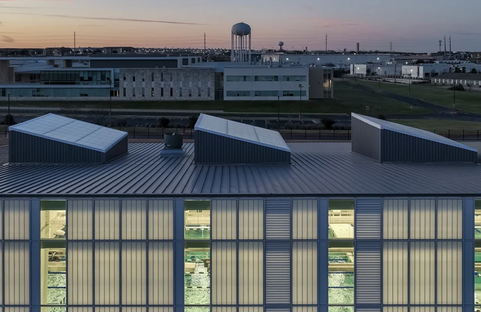 Image of a Kalwall Factory Mutual Certified Roof System | FM 4471 overhead at dusk